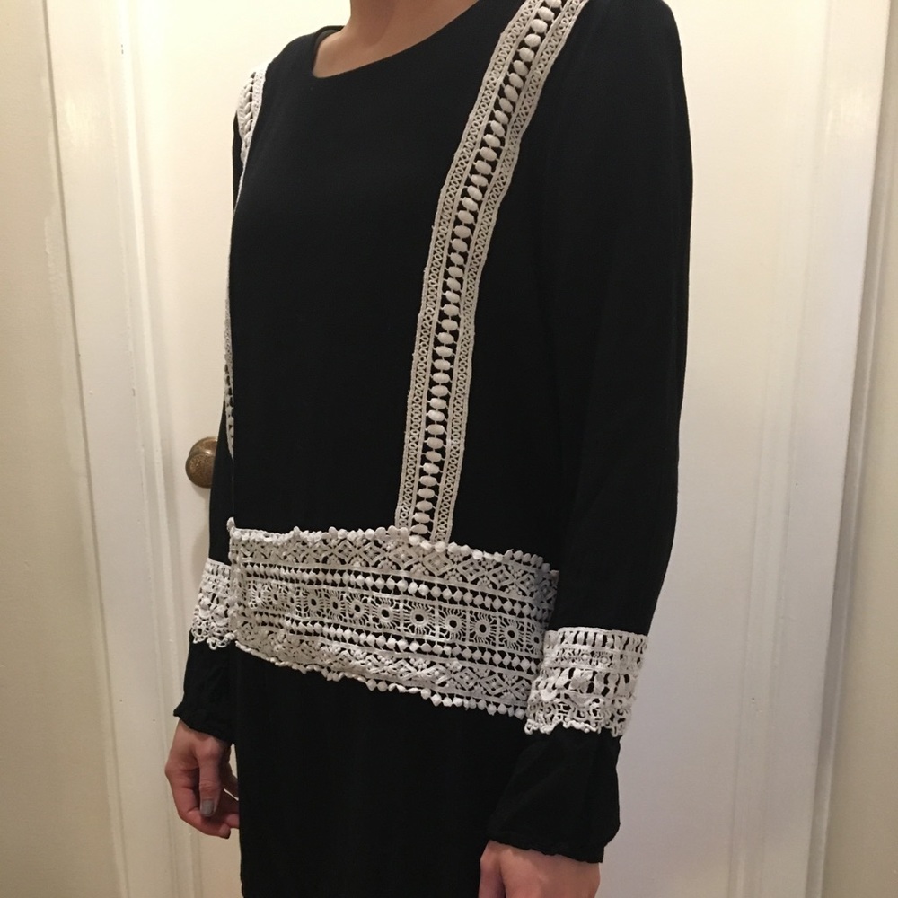 Black tunic with white patterned lace